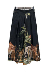Trouser skirt with tropical print. Colors: Black, khaki green, and white LILAC or LIGHT BLUE. ONE size: fits from 34 to 40. Coordinated blouse available (only 1 unit)