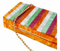 Clutch in cheerful tones: Orange, green, pink.