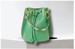 Bolso bombonera de piel en 8 colores. Con asa corta con ollaos dorados + asa larga de cadena con piel. Disponible en 7 colores.