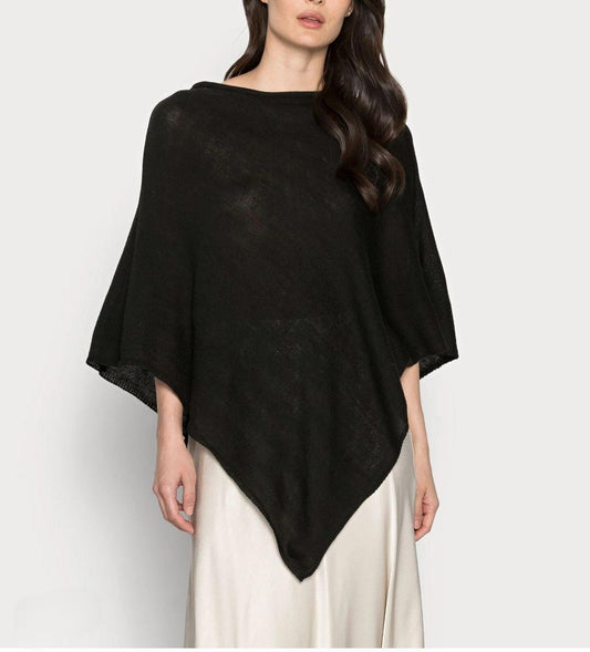 Knitted cape or poncho in shiny BLACK.