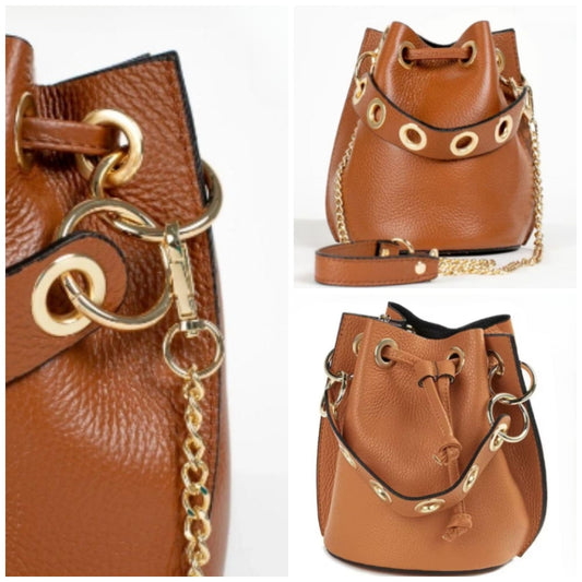 Leather bucket bag in 8 colors. With short handle with gold eyelets + long chain handle with leather. Available in 7 colors.