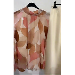 Large size: Chiffon blouse in earth and pink tones. Goes up to size 52