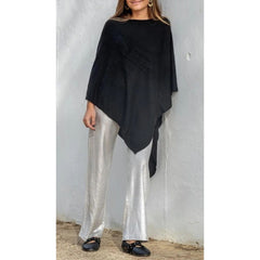 Fine knit cape or poncho. Available in various colors. Novelty