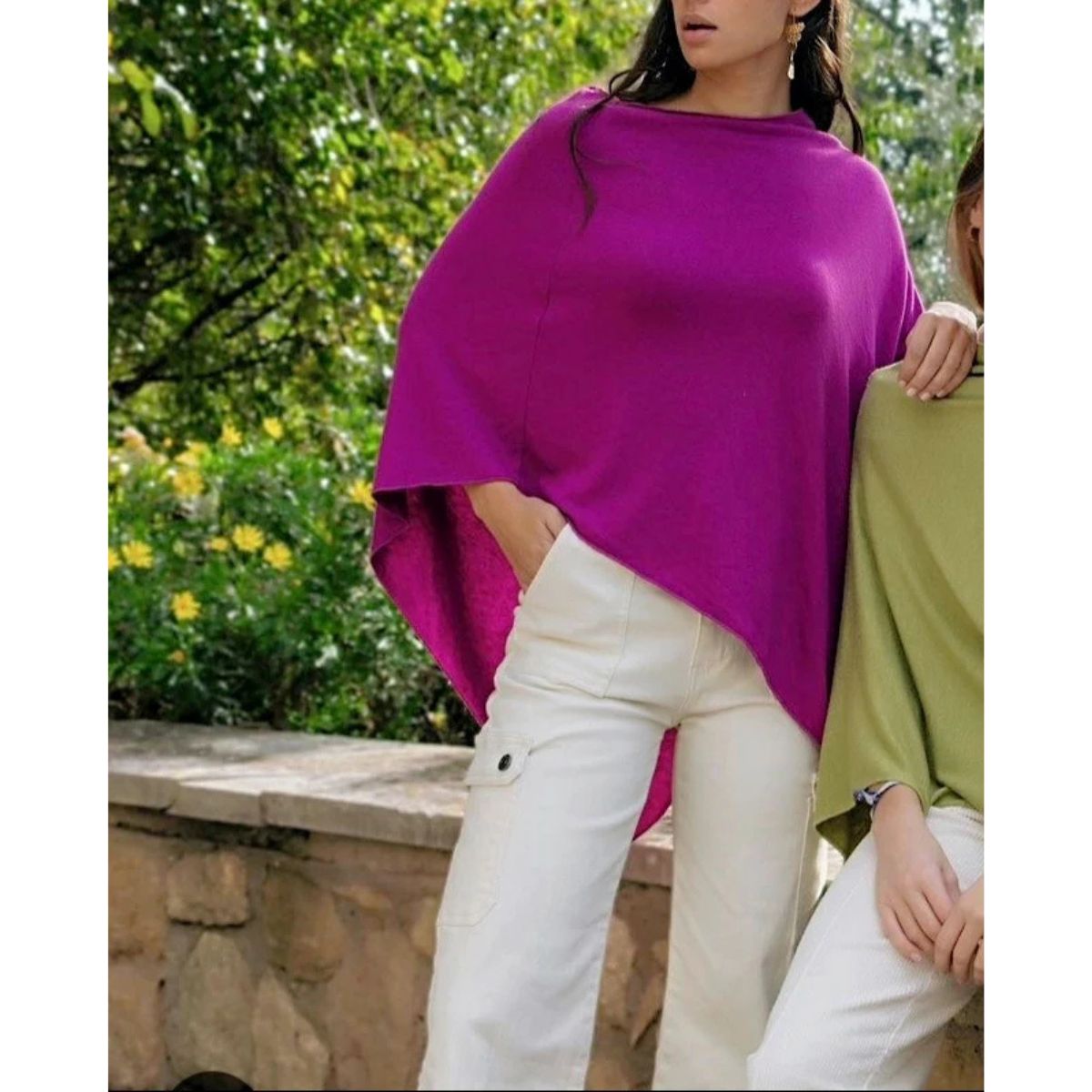 Fine knit cape or poncho. Available in various colors. Novelty