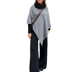 Fine knit cape or poncho. Available in various colors. Novelty