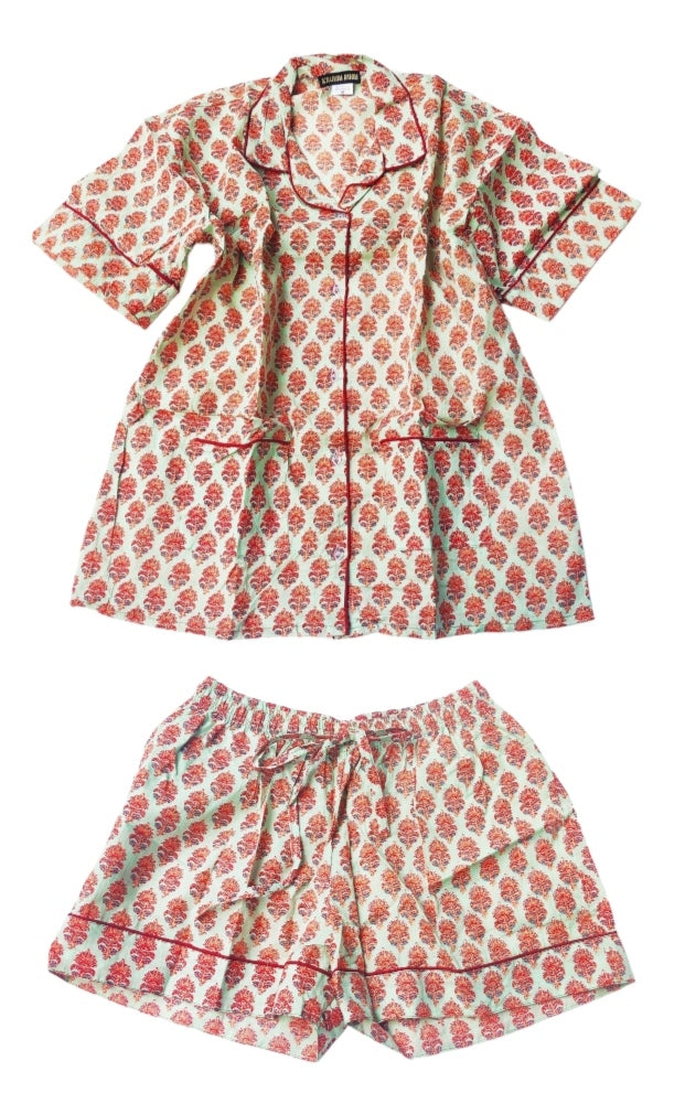 PIJAMA de mujer. Colores verde y naranja. Algodón 100%. Bolsa a juego para guardarlo.