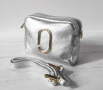 Medium leather bag. Colors: Gold, Silver and Old Gold