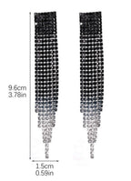 Pendientes de fiesta con brillantes negros. Pendientes largos. Novedad