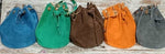 Suede leather bucket bag with eyelet handle + gold chain. Various colors available