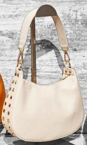 Leather bag with gold studs.