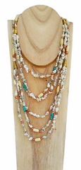 Long beige necklace with shells and turquoise blue touches