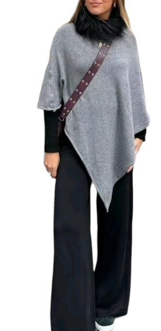 Fine knit cape or poncho. Available in various colors. Novelty