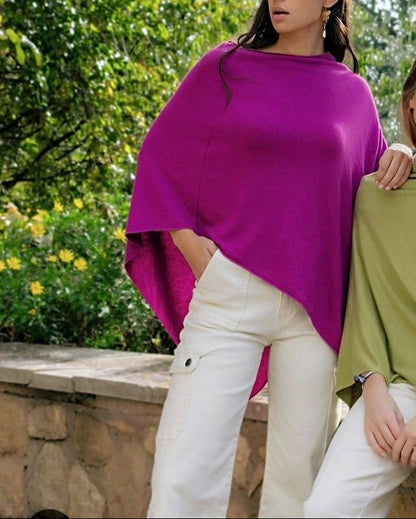 Fine knit cape or poncho. Available in various colors. Novelty