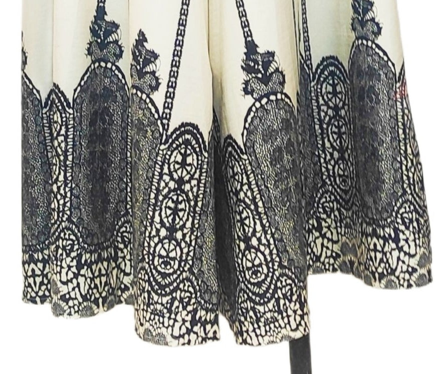 CONJUNTO con TOTAL LOOK 2: FALDA Pantalón color MARFIL con estampado de encaje negro. Talla ÚNICA: da desde la 34 hasta la 44. Conjunto VALENCIA. Calidad PREMIUM (Copia)