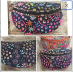 Blue cotton waist bag. Embroidered on the floral print