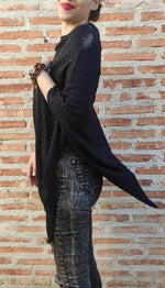 Poncho negro glitter