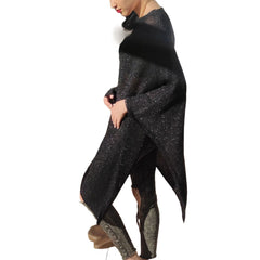 Fine knit cape or poncho. Available in various colors. Novelty