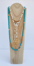 Collar largo color azul turquesa de cuentas de lava (modelo 3)