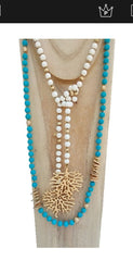 Long turquoise blue necklace with golden lava beads (model 1)