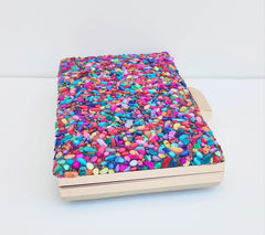 Party bag. Multicolored clutch with medium colored stones