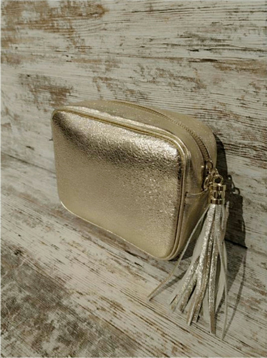 Bolso bandolera de piel. Color oro o plata. GENUINE LEATHER BAG